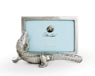 silver color horizontal frame with alligator figure along the bottom of the frame