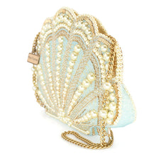 Load image into Gallery viewer, side view of the scalloped sea shell shaped hand bag heavily beaded with blue and gold beads and pearls
