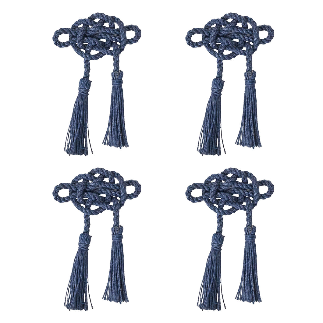 Four napkin rings made from knotted blue cord 