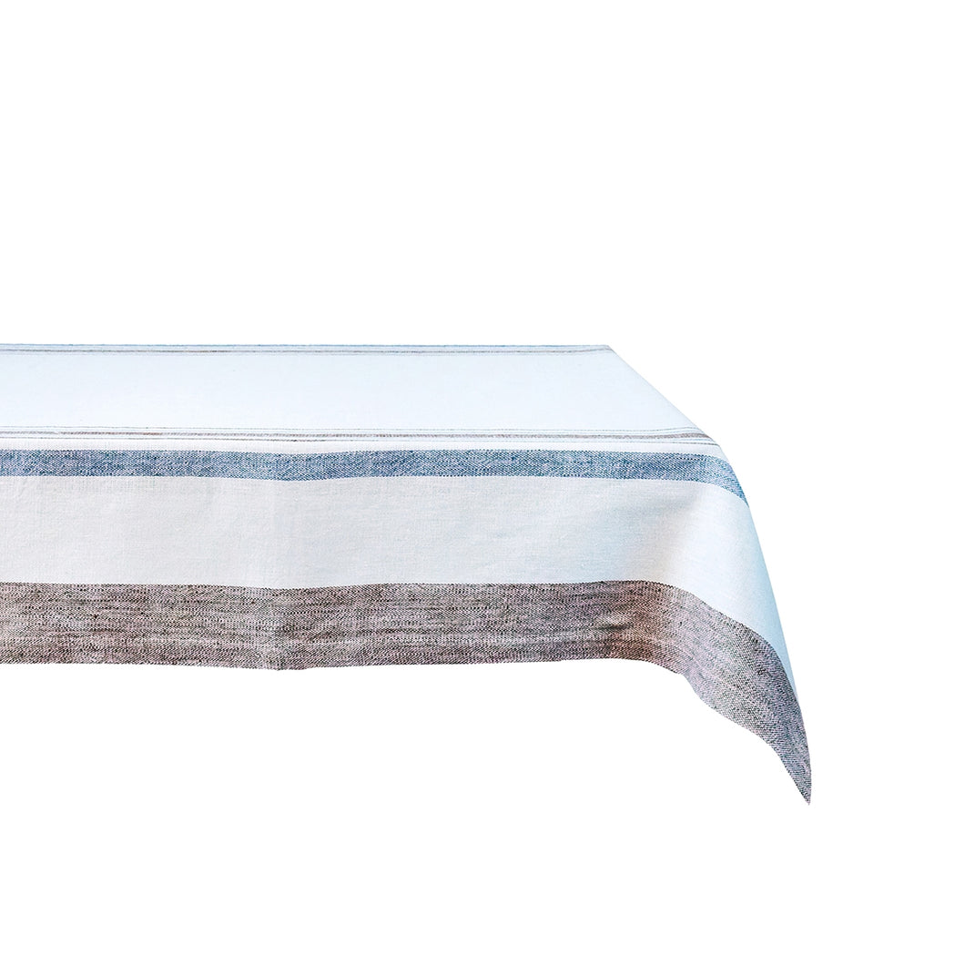 White table cloth with blue and brown stripes in variance widths 