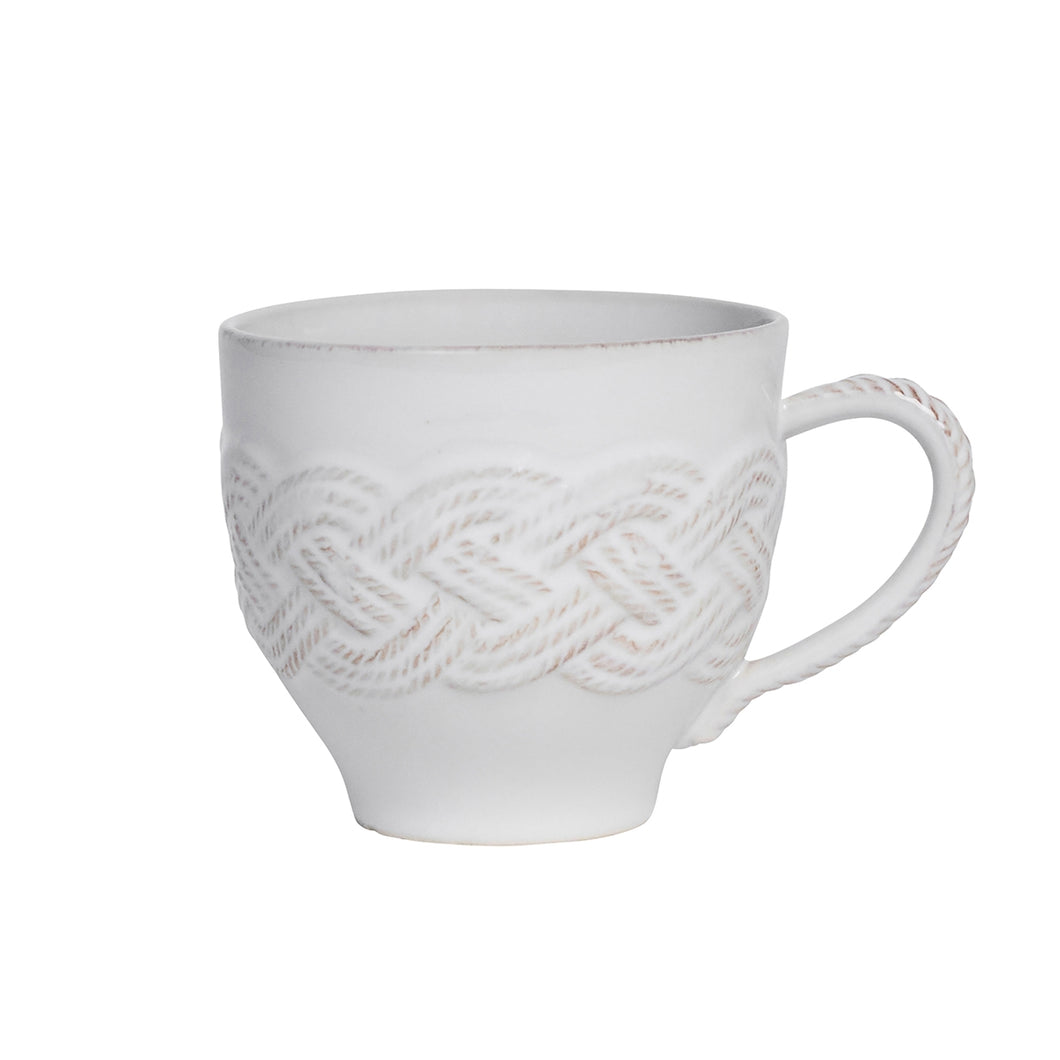 Tea cup with woven knot pattern