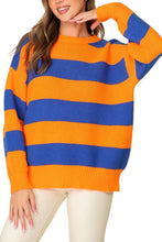 Load image into Gallery viewer, woman in orange and blue horizontal striped sweater 
