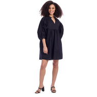 woman wearing short dress with 3/4 puffed sleeves 