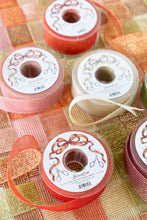 Load image into Gallery viewer, several spools of Hester &amp; Cook Fancy Sparkle Ribbon
