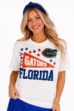 Load image into Gallery viewer, woman in white t-shirt with a Florida Gators Pennant, stars and the gator head logo 
