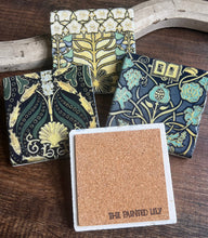 Load image into Gallery viewer, four coasters one turned over to show cork backing
