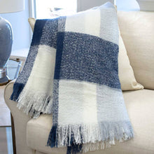 Load image into Gallery viewer, Crestland Throw - Navy/White on a couch 
