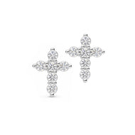 A pair of silver cross stud earrings set with clear round-cut gemstones, displayed on a clean white background.