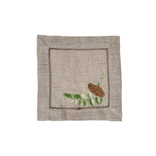 Load image into Gallery viewer, tan square napkins with an embroidered with pine cones
