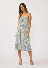 Load image into Gallery viewer, person wearing the Convertible Smocked Skirt as a dress
