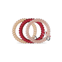 Load image into Gallery viewer, three teleties tan and red, red, and white and red
