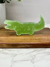 Load image into Gallery viewer, green gummy candy on a cutting board
