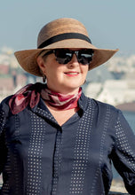 Load image into Gallery viewer, woman in sunglasses wearing the Chloe Hand-woven Palm Hat
