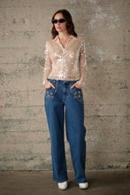 Load image into Gallery viewer, Sequin Mesh Long Sleeve Top in Ivory paired with blue jeans
