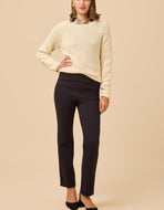 Spartina 449 Shannon Straight Leg Ponte Pant Black paired with cream colored sweater 