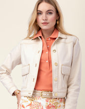 Load image into Gallery viewer, close up on the gold button of the Spartina 449 Kiersten Denim Jacket Sand paired with a coral pink shirt

