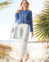 Load image into Gallery viewer, person on the beach wearing Mable Wide Leg Jean Flagler Resort Stripe paired with blue sweater 
