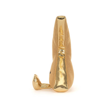 Load image into Gallery viewer, Plush toy shaped like a lightning bolt side view with gold fabric and gold legs
