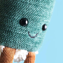 Load image into Gallery viewer, Close-up of Jellycat Amuseables Hosomaki bag charm showing textured green fabric, shiny black eyes and an embroidered smile.

