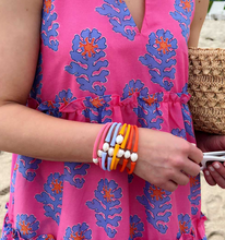Load image into Gallery viewer, person wearing a collection of Bali Freshwater Pearl Silicone BraceletS
