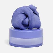 Load image into Gallery viewer, Speks Blur Calming Focus Putty in purple sitting on its storage container 
