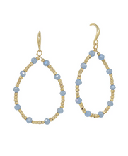 Load image into Gallery viewer, Pair of gold and blue beaded earrings on a white background
