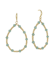 Load image into Gallery viewer, Pair of hoop earrings with gold and light blue beads on a white background
