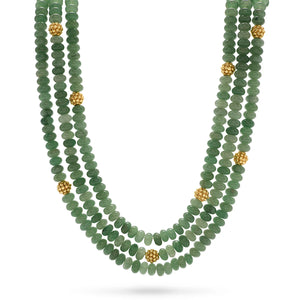 Triple strand necklace of green jade and gold accents 