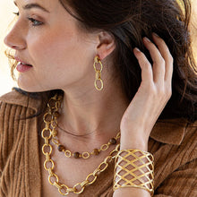 Load image into Gallery viewer, woman  wearing gold jewelry
