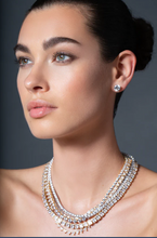 Load image into Gallery viewer, person wearing Crislu Pure Platinum earrings and necklace
