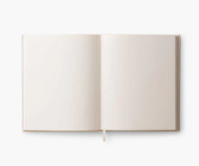 Load image into Gallery viewer, Open Embroidered Fabric Sketchbook with blank paper

