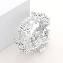 Load image into Gallery viewer, silver bracelet with two gators covered in crystals  showing the hinge on the back of the bracelet 
