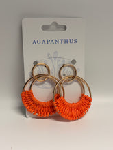 Load image into Gallery viewer, Set of orange and gold hair ties on a branded card with 'Agapanthus' logo.
