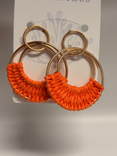 Load image into Gallery viewer, Orange and gold hair ties on a white card with text
