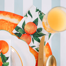 Load image into Gallery viewer, Hester &amp; Cook Orange Orchard Paper Napkins on a table with orange juice 
