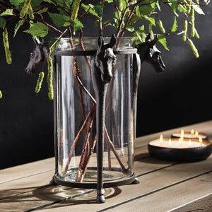 glass and metal hurricane with horse head accents 