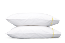 Load image into Gallery viewer, Two pillows with Matouk Essex pillowcases with two simple lines of embroidery in lemon yellow, one line a slightly lighter shade than the other

