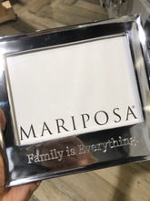 Load image into Gallery viewer, silver color frame engraved with 'Family is Everything'
