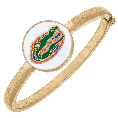 Gold bangle with round Gator head enamel charm