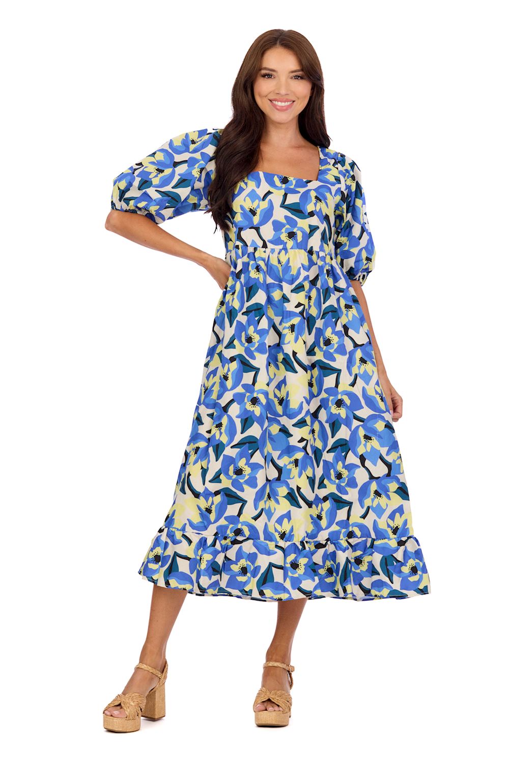 woman in long blue light yellow and white floral dress with puff sleeves