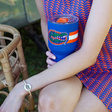 Load image into Gallery viewer, person wearing a gold gator bracelet
