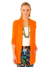 Load image into Gallery viewer, woman wearing Gretchen Scott Designs Open Cardigan Sweater with white top and print pants
