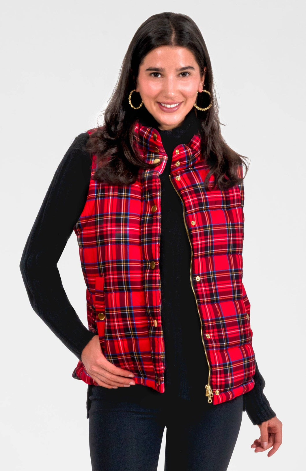 woman in black shirt and red plaid vest