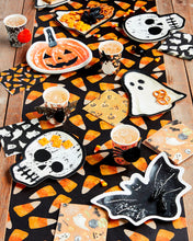 Load image into Gallery viewer, table set with halloween themed paper plates and napkins 
