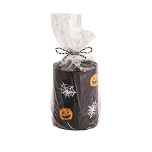 Load image into Gallery viewer, Black pillar candle with pumpkin and spider web designs
