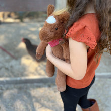 Load image into Gallery viewer, child holding Mon Ami Cinnamon Horse

