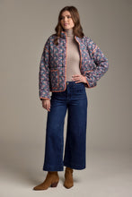 Load image into Gallery viewer, person wearing Jake Wide Leg Pants, wide leg blue jeans with turtle neck floral jacket and brown boots

