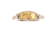 Load image into Gallery viewer, A plush toy designed to look like ski goggles, featuring a soft gray fabric body, faux-fur details on the sides, and a shiny gold reflective lens with a cute embroidered smiley face.
