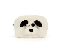 Load image into Gallery viewer, A fluffy cream-colored pouch shaped like a dog face, featuring black ears, nose, and eye details, set against a plain white background.
