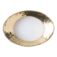 Load image into Gallery viewer, One gold oval shaped napkin ring with a hammered texture
